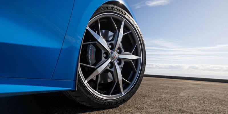 Close-up of blue sports car wheel