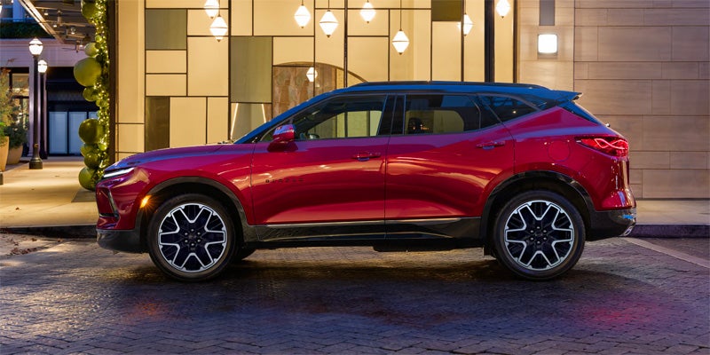 Man opens door, woman opens trunk