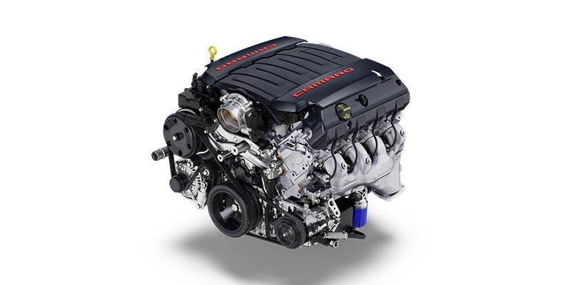engine with a black cover featuring red Performance text