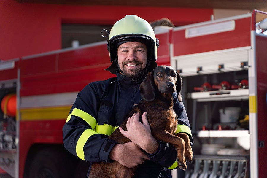 Fire Fighter with Dog